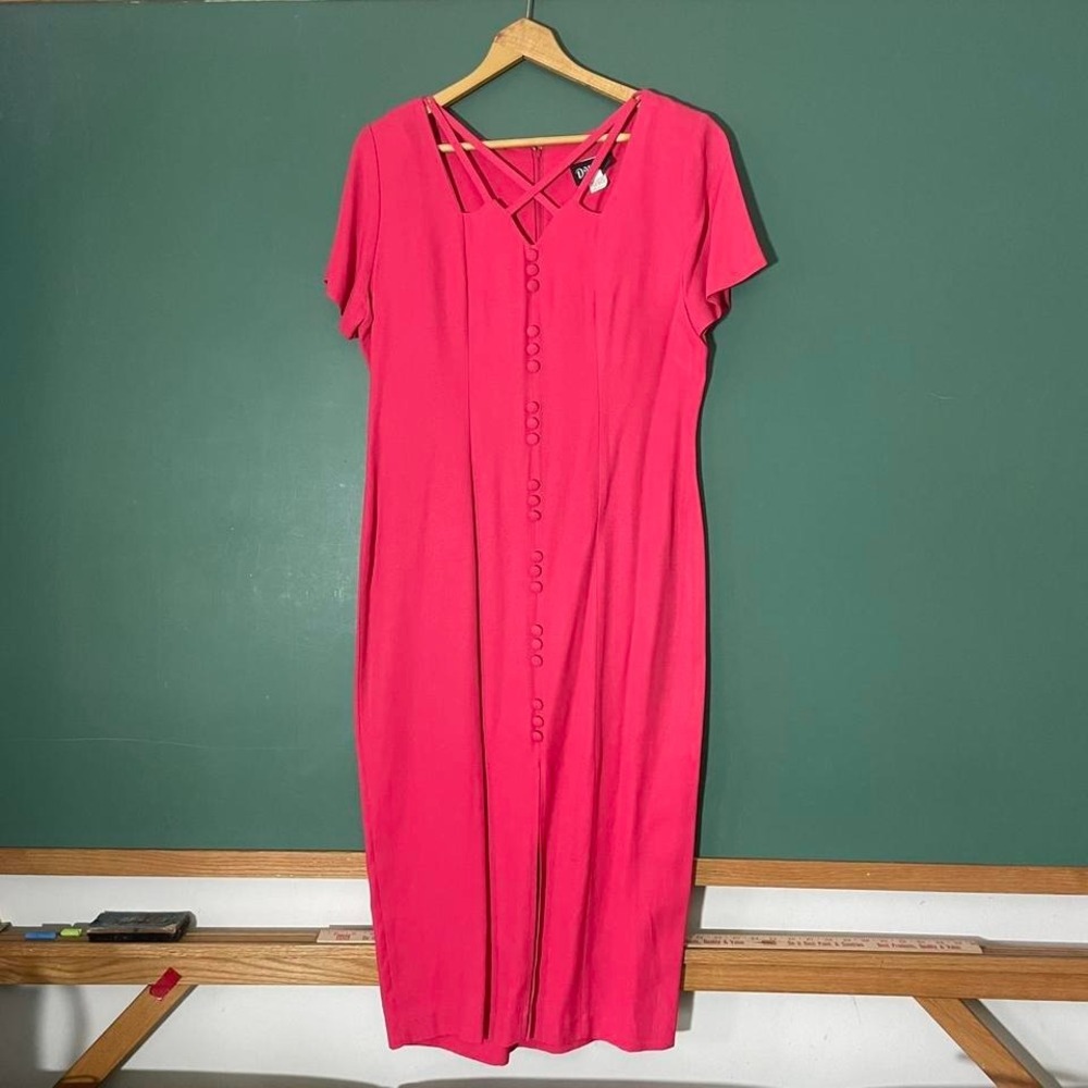 Vintage 1980s midi dress with shoulder pads and criss cross detail‎